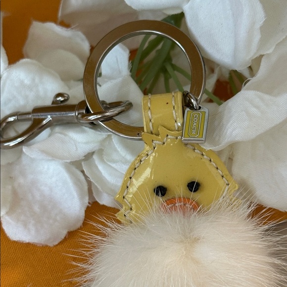 Coach Yellow and White Pom Pom Keychain - Picture 2 of 7